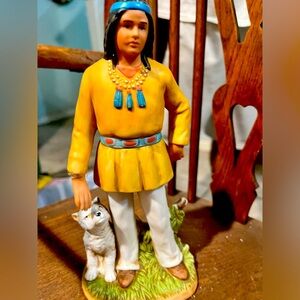 vintage HOMCO porcelain figurine featuring a Native American man and a wolf cub